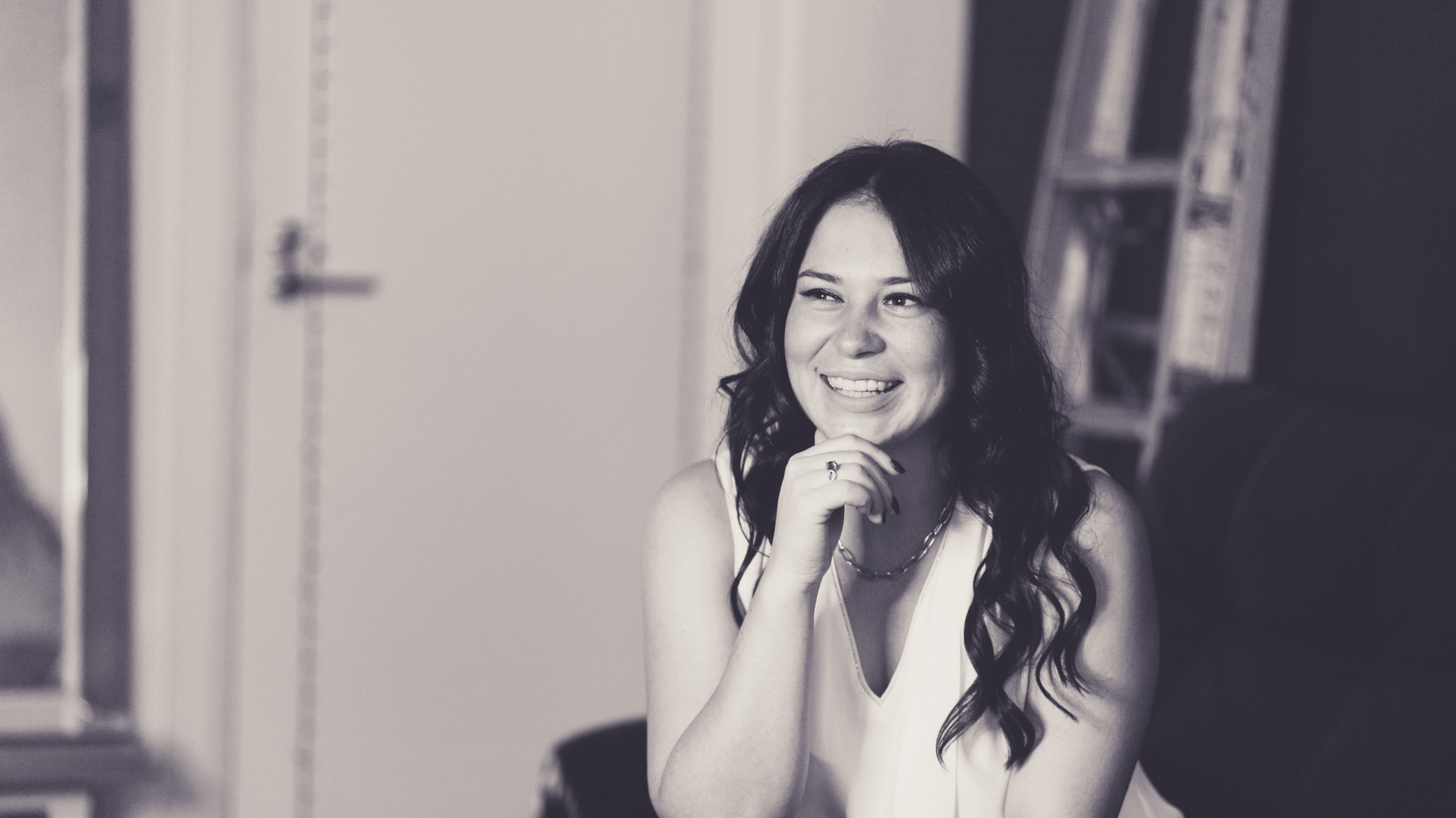 Happy smiling young woman BW MariaKJewellery